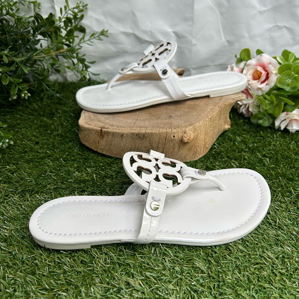 Tory Burch 
Miller cut-out leather flip-flops
$267 Sandals Sz 59 optical white - Picture 7 of 16